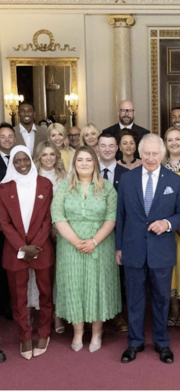 Mrs. Zamana (first left) in a photo with King Charles III (first right) during the award ceremony organized by the King